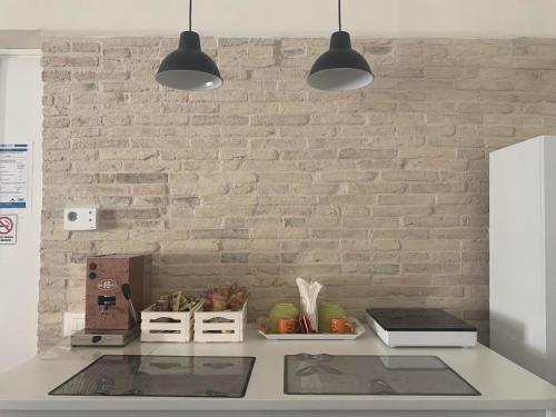 A kitchen or kitchenette at Affittacamere La Torre