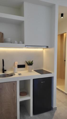Cuisine ou kitchenette dans l'établissement Maeva Suites Santorini
