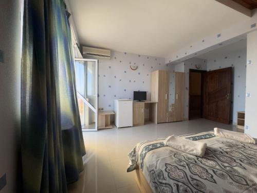 Ένα ή περισσότερα κρεβάτια σε δωμάτιο στο Guest House Rubin