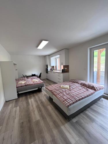 Postel nebo postele na pokoji v ubytování Apartmány Pohoda a Klid
