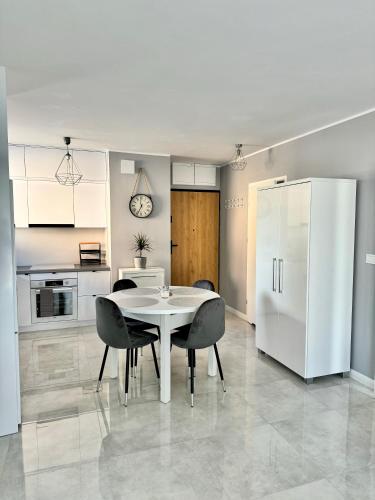 Кухня или мини-кухня в Apartament nad jeziorem Magistrackim w Mrągowie
