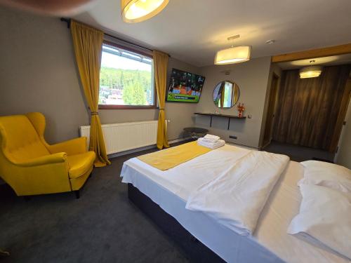 Postel nebo postele na pokoji v ubytování CASA FLORESCU