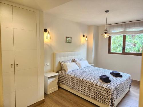 Giường trong phòng chung tại Apartment Lime Golden Star, Javea