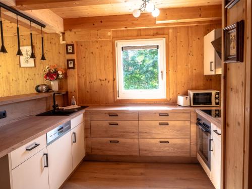 Una cocina o zona de cocina en Woody Park
