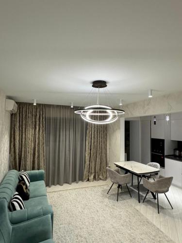 Posezení v ubytování Элитная квартира в самом центре города