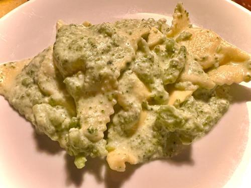 a piece of food on a white plate at Le Mandrie Di San Paolo in Assisi
