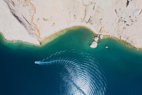 an aerial view of a whale swimming in the ocean at Villa Mars in Mandre