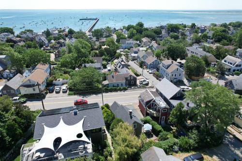 an aerial view of a small town with a building with a large white logo at Private Home Great Location Dog Friendly in Provincetown