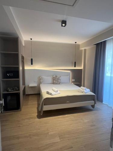 a bedroom with a large bed in a room at Residenza Gurnea - Free Private Parking in Tropea
