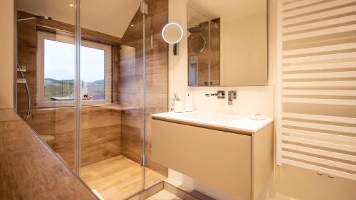 Ένα μπάνιο στο Ferienwohnung Beachside 21