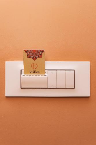 a box is sitting on top of a scale at Hotel Vistara in Kathmandu