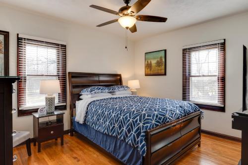 a bedroom with a bed and a ceiling fan at Idyllic Home Near Lucas Oil Stadium and Dtwn Indy! in Indianapolis