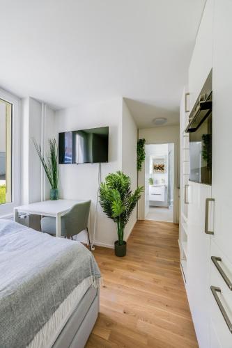 Katil atau katil-katil dalam bilik di HRE Apartments St Gallen City Center