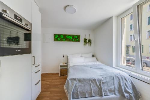 Katil atau katil-katil dalam bilik di HRE Apartments St Gallen City Center