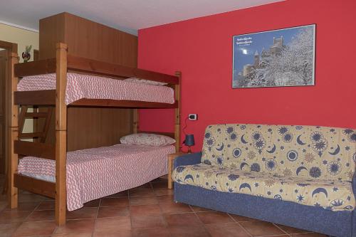 Postel nebo postele na pokoji v ubytování Case Gran Paradiso Rhemes Notre Dame