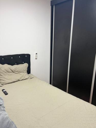 Postel nebo postele na pokoji v ubytování Quarto vip apto compartilhado