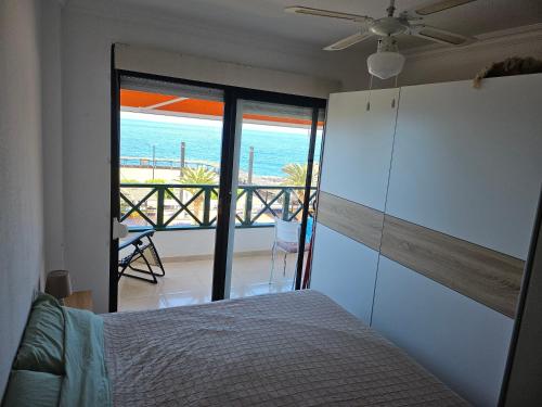 En eller flere senge i et værelse på Aimée maritima puerto santiago