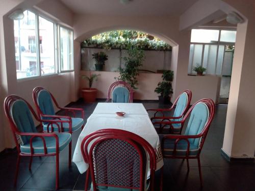 a dining room with a table and chairs at Tanja Terrace Appartments Dobre Vode in Dobra Voda