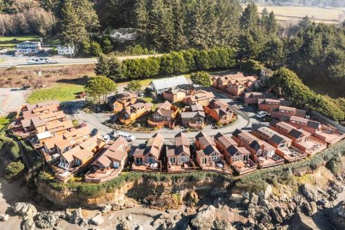 an aerial view of a home on a cliff at Sand Castle - Ocean Cabin 25 W Private Jacuzzi in Smith River
