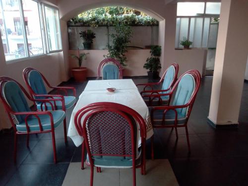 a dining room with a table and chairs at Tanja Terrace Appartments Dobre Vode in Dobra Voda