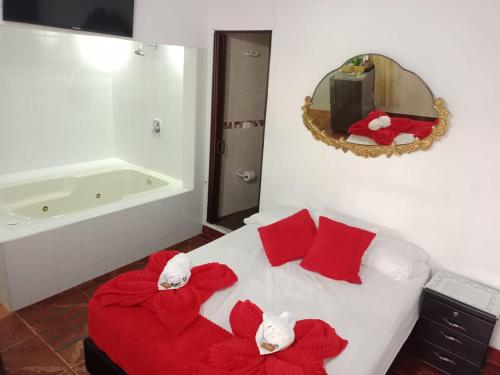 Postel nebo postele na pokoji v ubytování Libélula finca-hotel