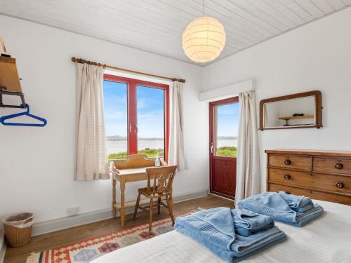 Postel nebo postele na pokoji v ubytování Salmon Cottage
