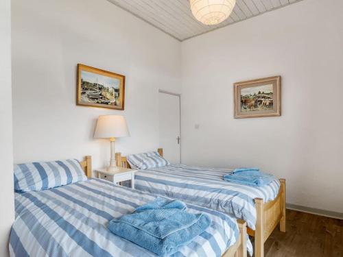 Postel nebo postele na pokoji v ubytování Salmon Cottage