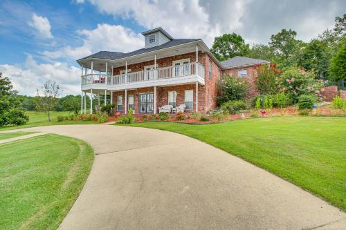 a large brick house with a driveway at Beautiful Home Less Than 1 Mi to Hot Springs National Park in Hot Springs