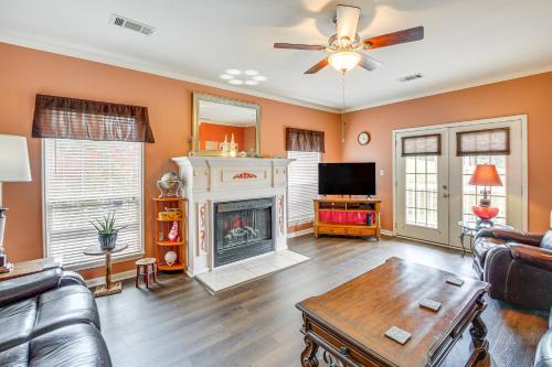 a living room with a couch and a fireplace at Beautiful Home Less Than 1 Mi to Hot Springs National Park in Hot Springs