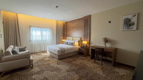 Postel nebo postele na pokoji v ubytování فندق ايليت الهجرة Elite AL Hijra Hotel