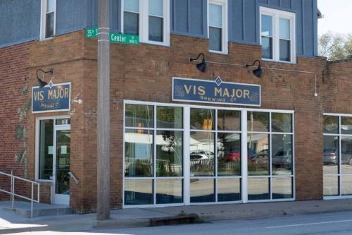 a brick building with a vs marrior sign on it at Center Midtown WalkUp in Omaha