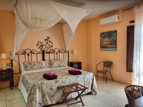 Postel nebo postele na pokoji v ubytování HOTEL PASTERAL RIU TER