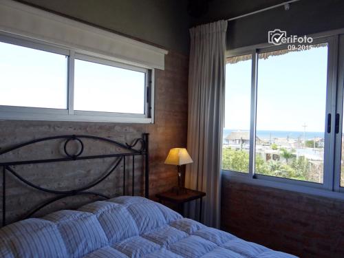 Ένα ή περισσότερα κρεβάτια σε δωμάτιο στο Balcones de Mar