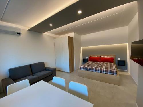 Postel nebo postele na pokoji v ubytování NEW Residenza le Essenze - i 7 Laghi