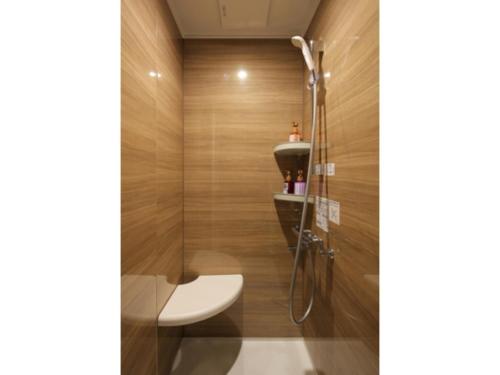 a bathroom with a shower and a toilet at Aso Hakuun Sanso - Vacation STAY 77833v in Aso