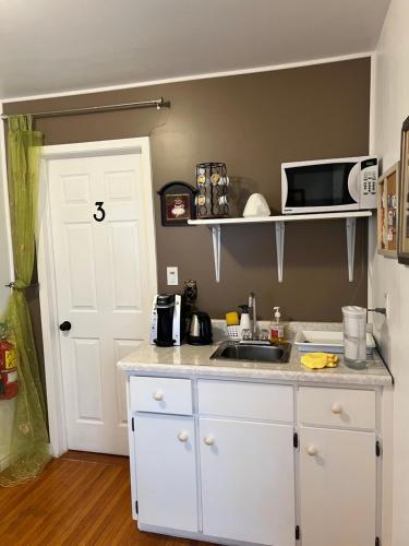 Η κουζίνα ή μικρή κουζίνα στο Cozy House B&B