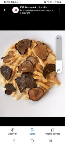 a picture of a dessert with cookies on it at Hotel Regina Yeti Bistrot in Sestola