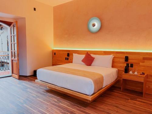 Ένα ή περισσότερα κρεβάτια σε δωμάτιο στο Sauvé Casa Boutique
