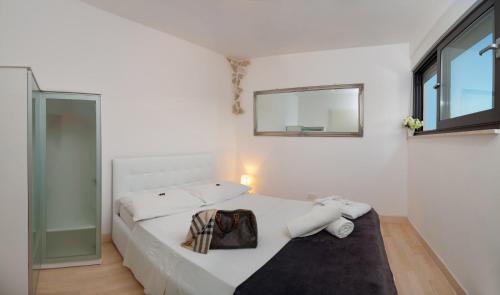 Posteľ alebo postele v izbe v ubytovaní Luxury Villa Luminosa