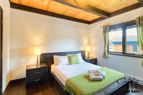 Ένα ή περισσότερα κρεβάτια σε δωμάτιο στο Chalet charmant - Détente familiale