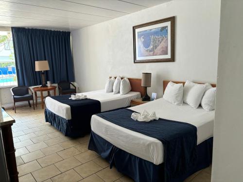 Postel nebo postele na pokoji v ubytování Brittany Motel