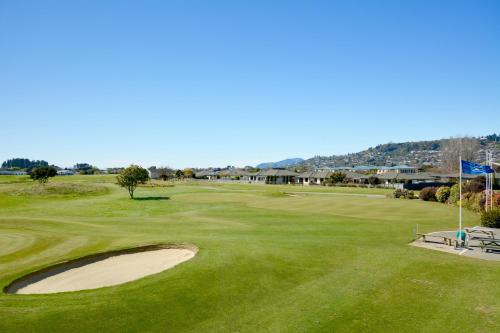 a view of the green at a golf course at Greens Motel in Nelson