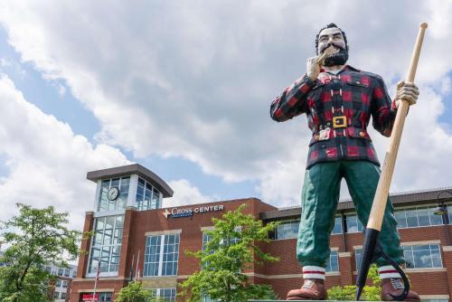 a statue of a man holding a baseball bat at Fireside Inn and Suites Bangor in Bangor
