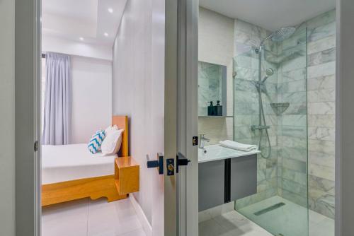 Ένα μπάνιο στο Monaco Residences Piantini