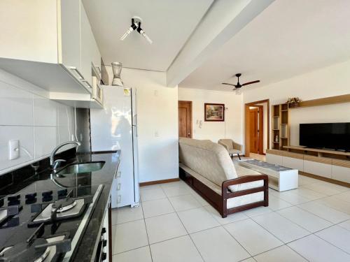 Η κουζίνα ή μικρή κουζίνα στο Melhor custo beneficio, 2 quartos, suíte, 3 splits , wi-fi