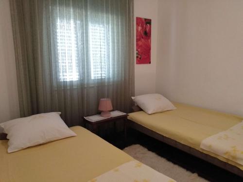 Apartments by the sea Grebastica, Sibenik - 23496