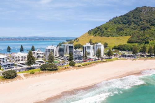 an aerial view of bondi beach in sydney at Sun filled & Spacious with Ocean Views & beach in Mount Maunganui