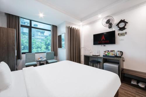 TV a/nebo společenská místnost v ubytování A25 Hotel - 109 Trúc Bạch