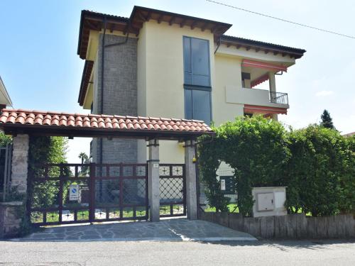 a house with a gate in front of it at Apartment in a prime location on Lake Maggiore in Verbania