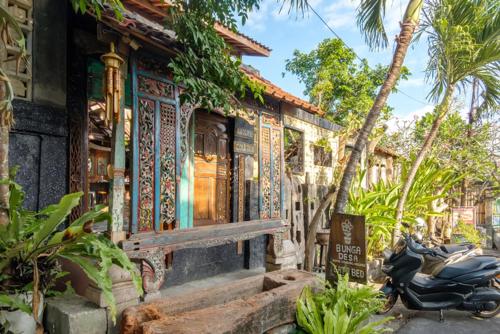 a scooter parked in front of a building at TwoSpaces Living at Bunga Desa, Jimbaran in Jimbaran